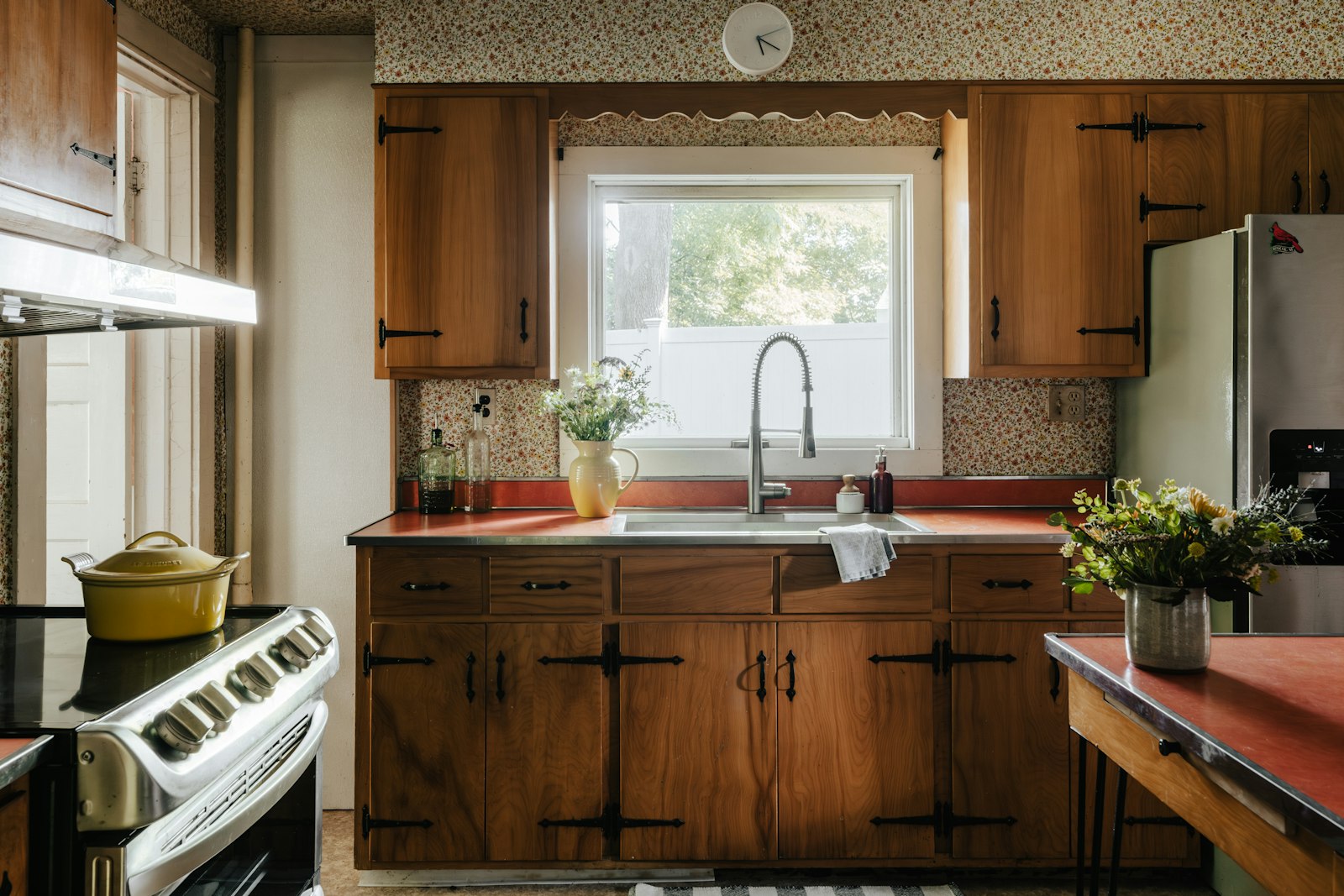 Dated wooden kitchen cabinets before refinishing